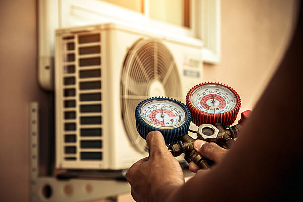 Professional Air Conditioning Service technician working in Meridianville, AL